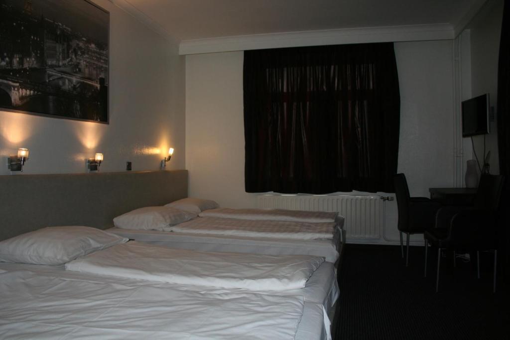 לאנקן Hotel Admiraal חדר תמונה